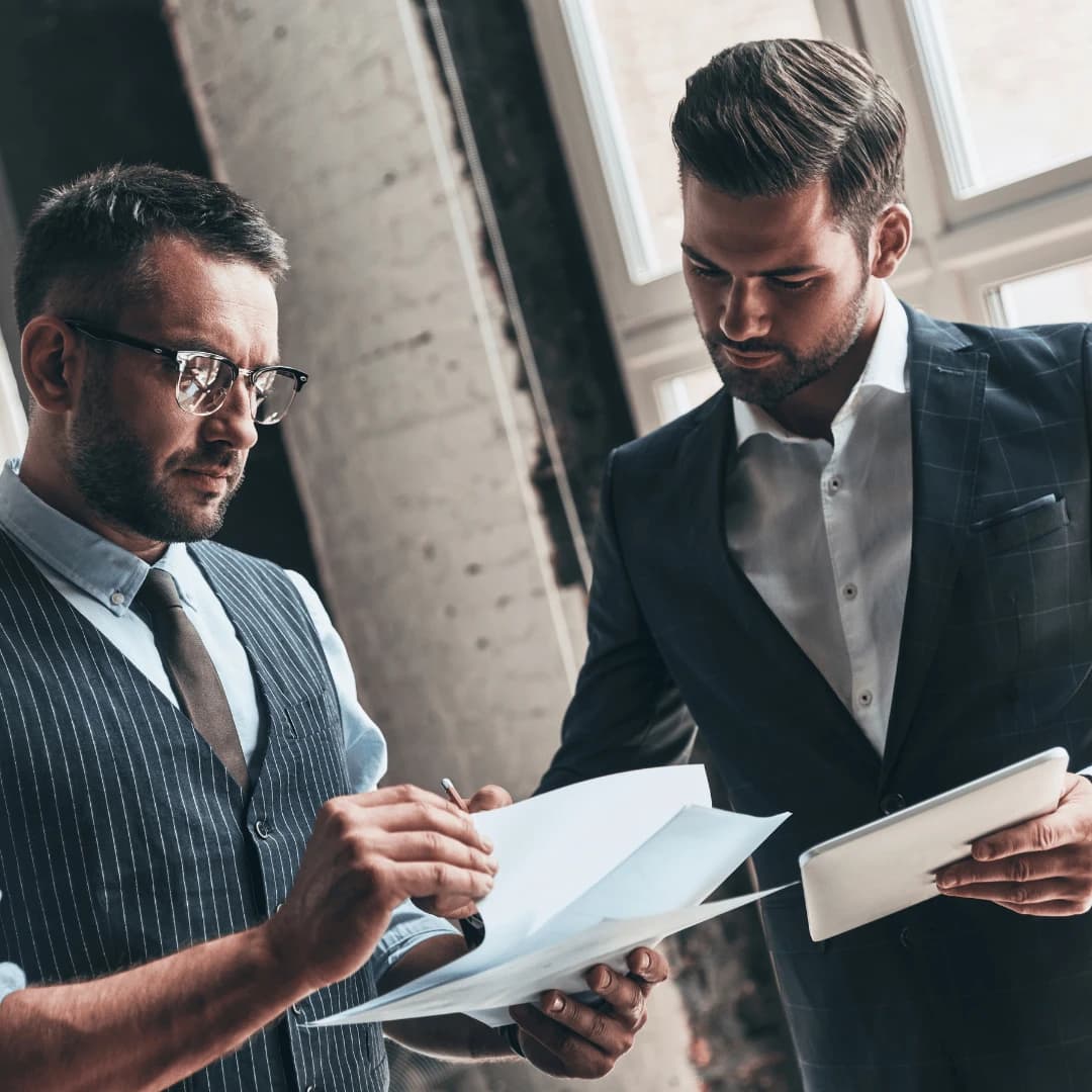 Marketer planning social media content on a whiteboard